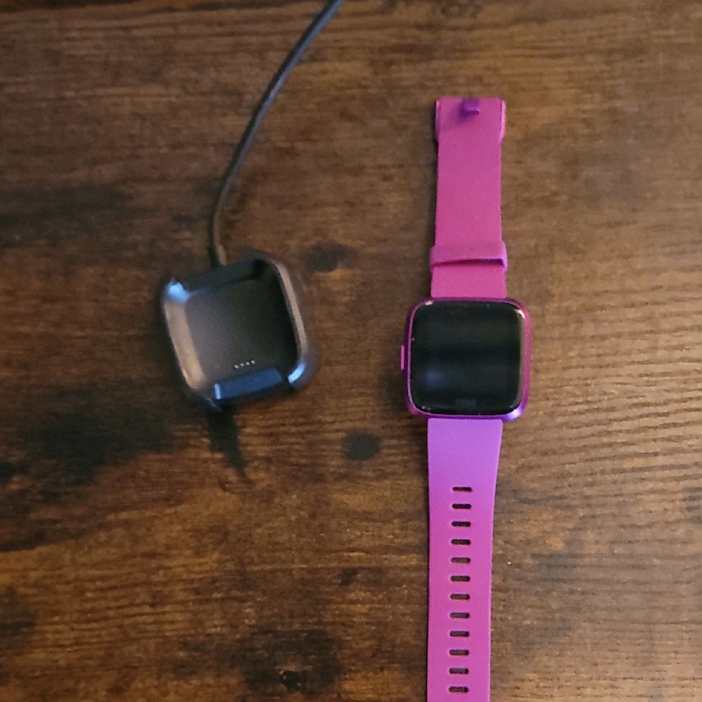 Fitbit Pink Smartwatch with Flexible Band and Adjustable Fit